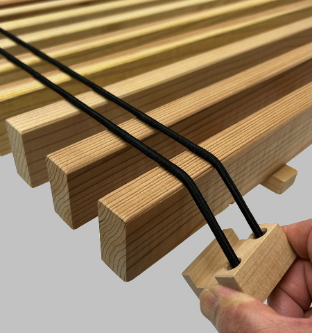 従来の縦すのこに、ゴムザイル＋ストッパーを装着